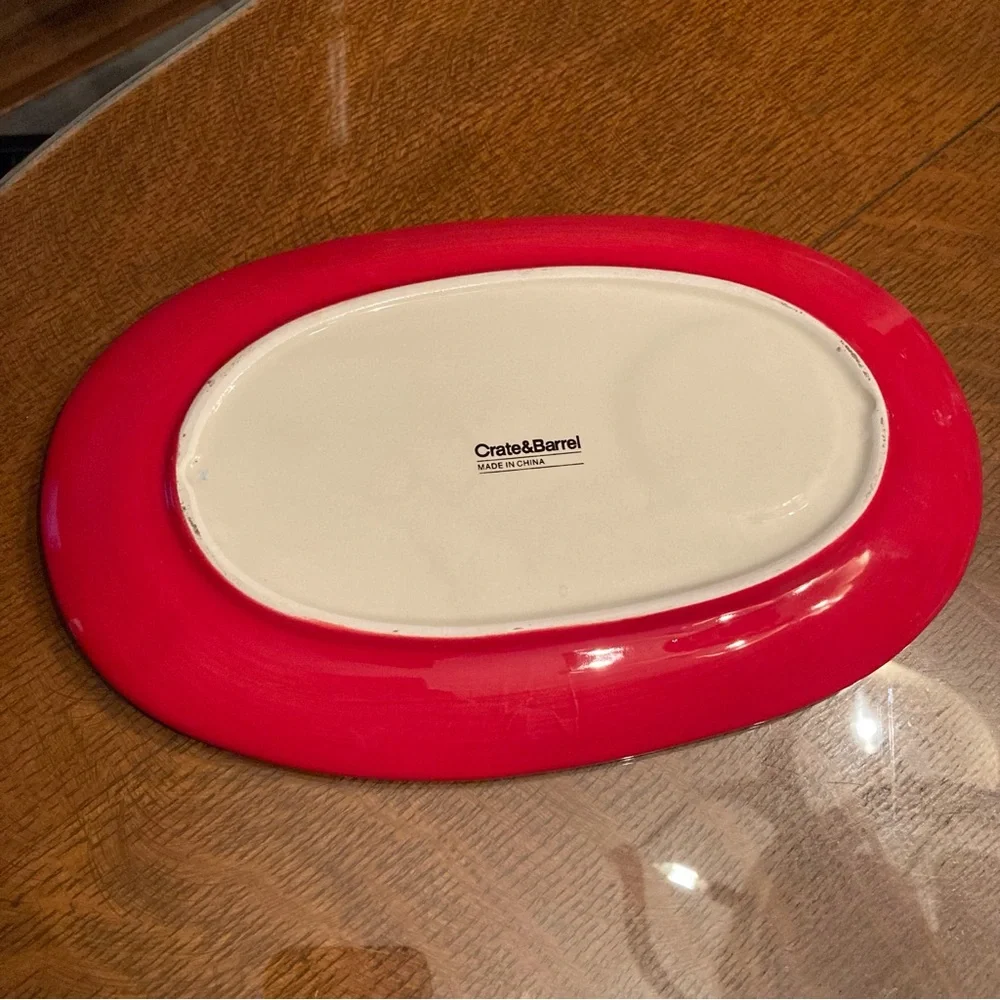 Crate & Barrel red and cream oval plate